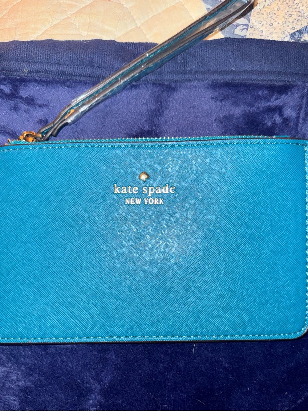 kate spade turquoise saffiano wristlet with gold logo